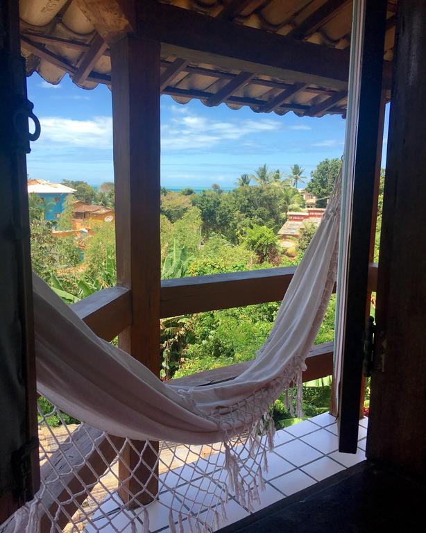 Novos Baianos Hostel E Pousada Porto Seguro Exterior foto Hammock in a hotel in San Juan del Sur, Nicaragua